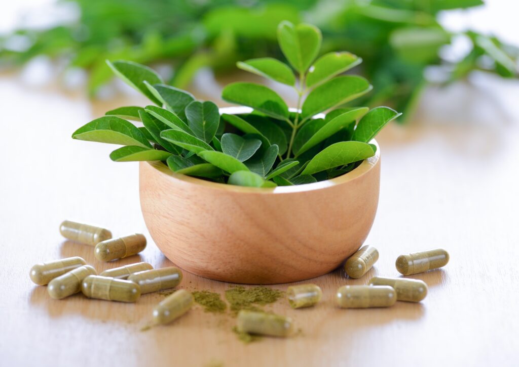 Moringa leaves and capsules (Herbs for health)