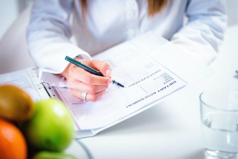 Nutritionist with female patient